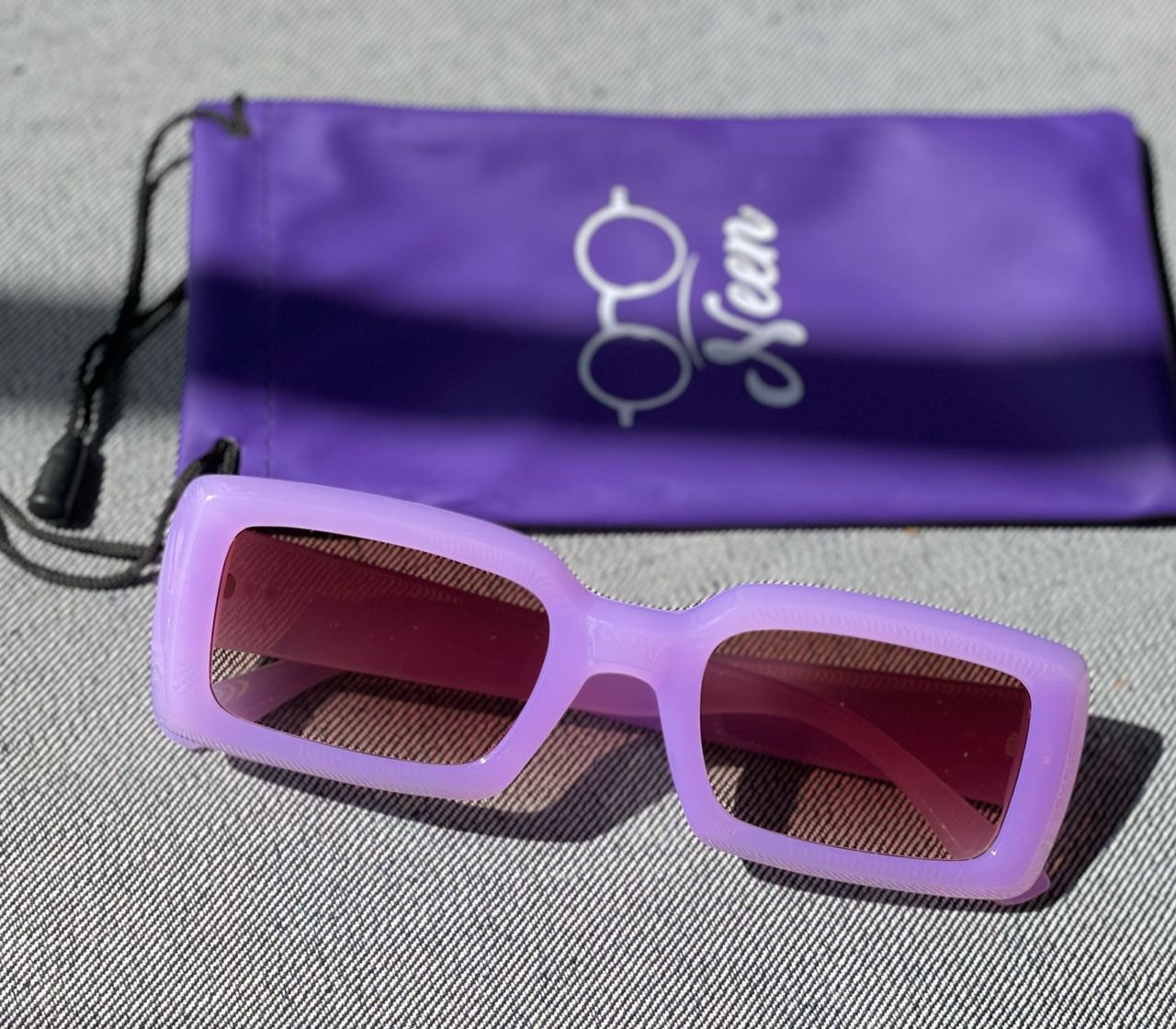 Lilac colored retro sunglasses