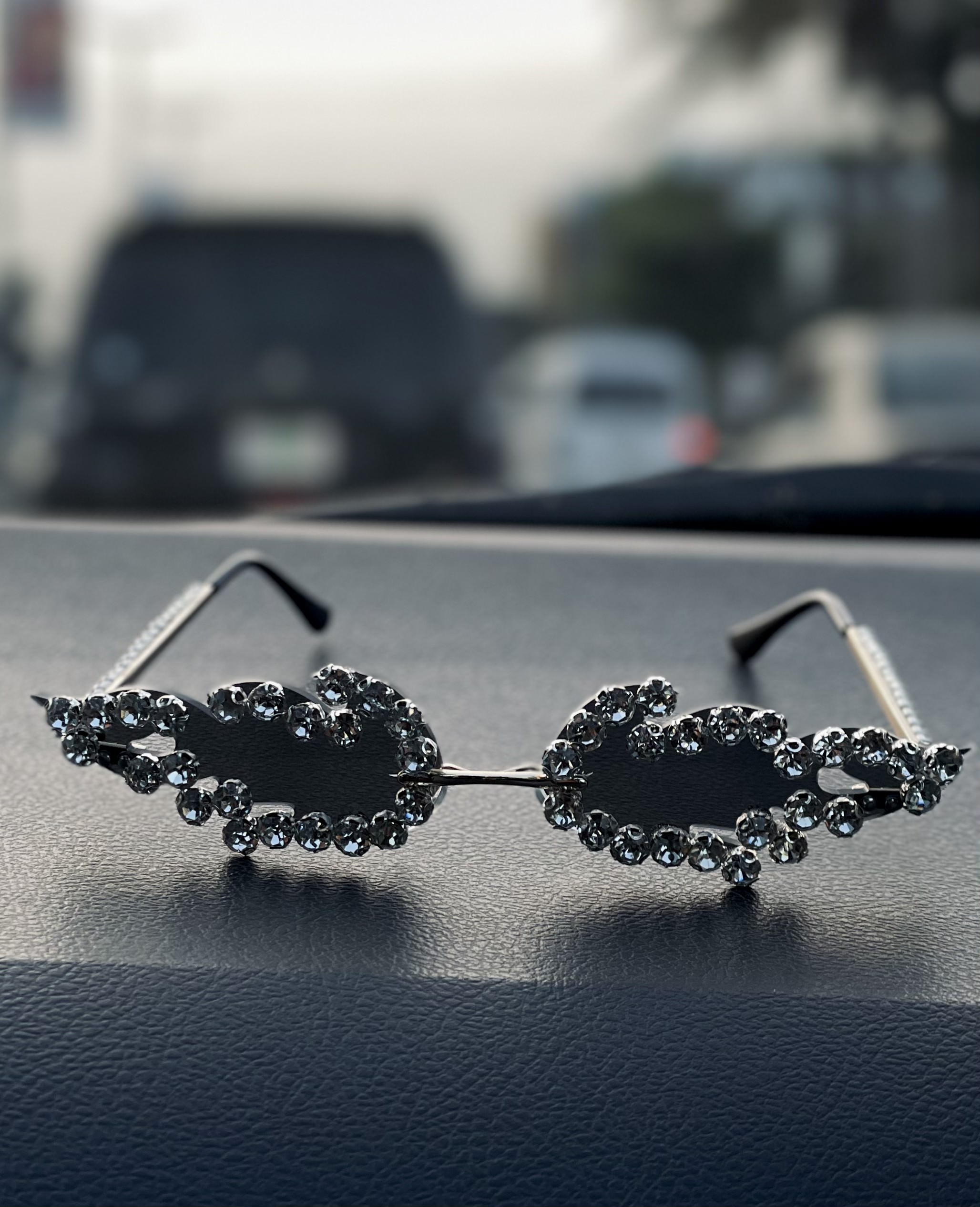 Heavily studded silver costume sunglasses